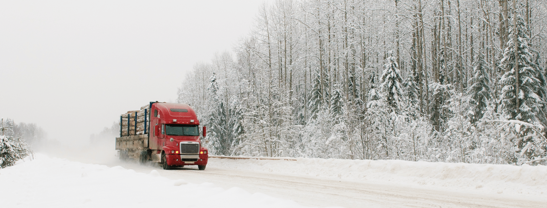 truck driving in snow